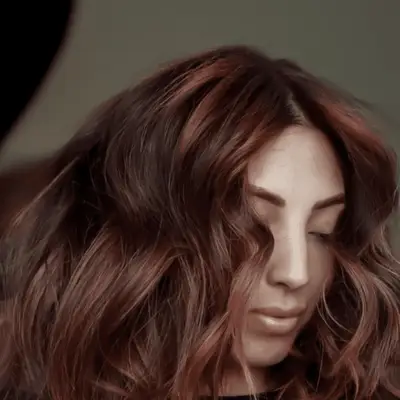 Chocolate cherry-colored hair.