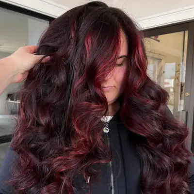 Chocolate cherry-colored hair.