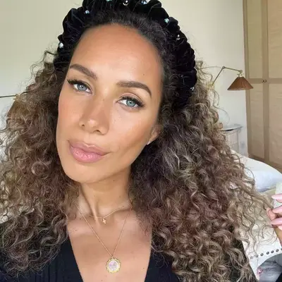 Leona Lewis with curly honey brown hair. 