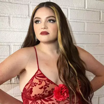 Meg Salter with honey money piece hair framing her face. 