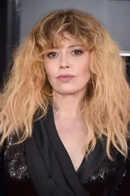 Natasha Lyonne undone long and wavy hair with bangs