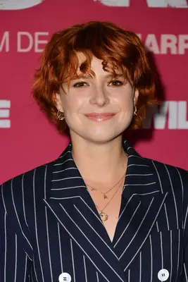 Jessie Buckley curly long pixie