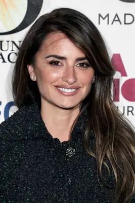 Penelope Cruz long hair with side-swept bangs