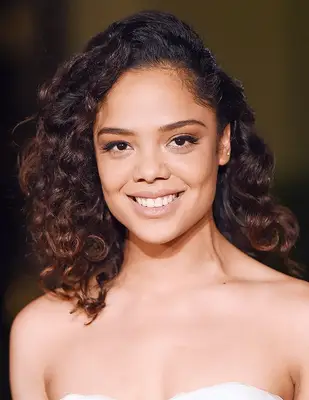 Tessa Thompson curly side-parted lob