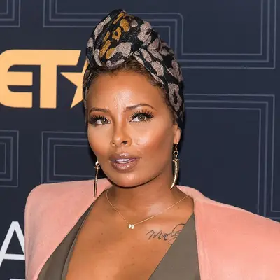 Eva Marcille with printed head wrap hairstyle 