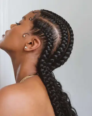 a side view of jumbo straightback cornrows with feed-in hair