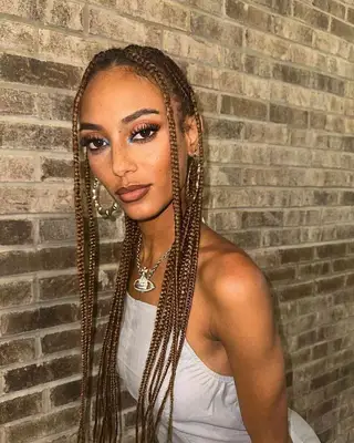 Woman with free-parted box braids