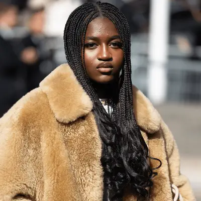 zaya wade wearing french curl braids