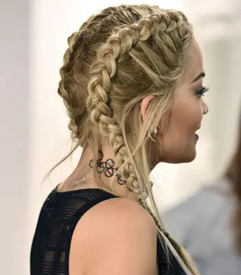Rita Ora wearing blonde Dutch braids on the red carpet