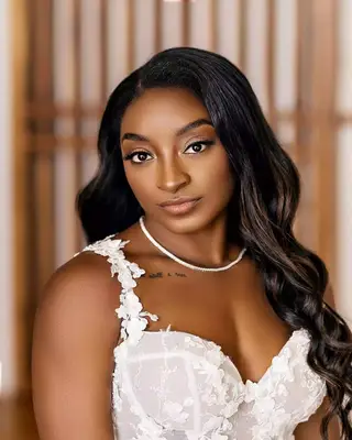 Simone Biles rocks old hollywood waves for her wedding photo shoot