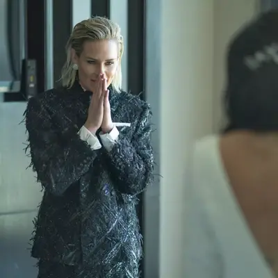 Ashlyn Harris wears her in slicked back style for her wedding