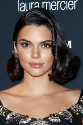 Kendall Jenner wears her short curls in a vintage-inspired hairstyle