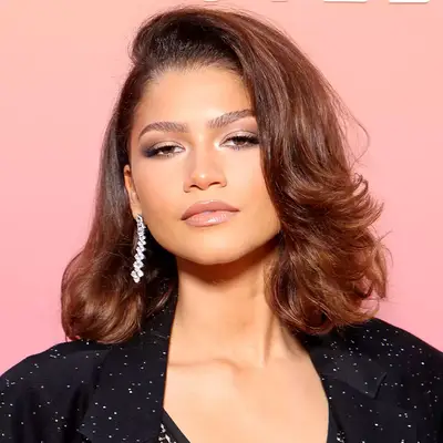 Zendaya close up, with bouncy, softly waved hair