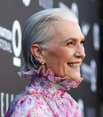 Maye Musk with a sleek bob hairstyle, slicked back