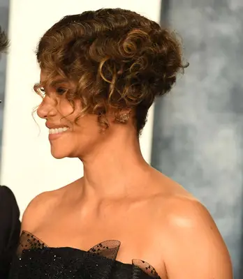 Side profile of Halle Berry, showing details of her Bixie haircut