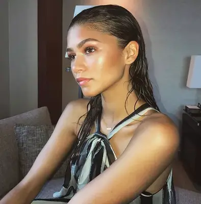 Zendaya with slicked back hair