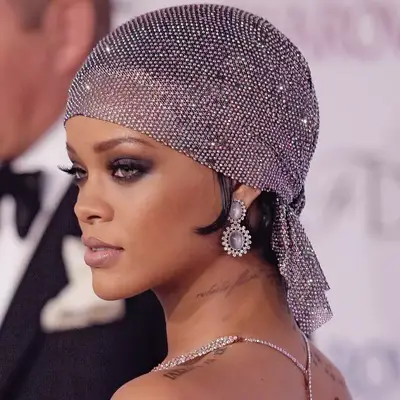 Rihanna with bejeweled head wrap
