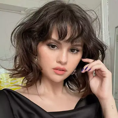 selena gomez with a short, wispy, butterfly bob