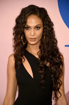 Joan Smalls long shag haircut with waves