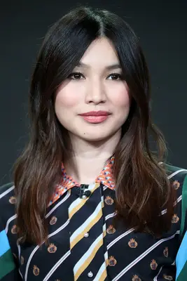 Gemma Chan wavy curtain bang shag haircut