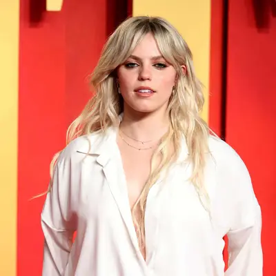 Renee Rapp with long shag