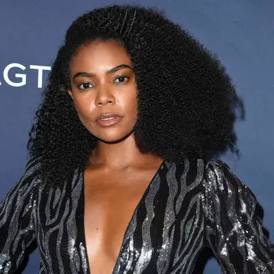 gabrielle union with side-parted mid-length curls