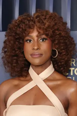 Issa Rae with Curly Auburn hair