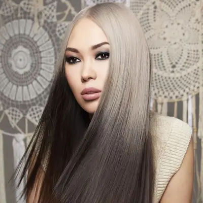 Woman with platinum to black reverse ombré hair