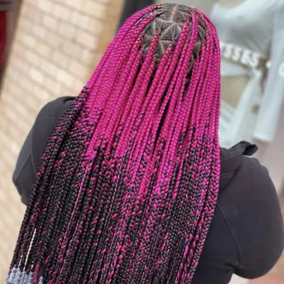 Woman with ombré pink braided hair