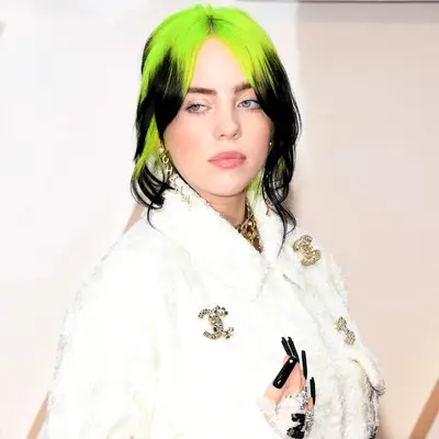 Billie Eilish with neon green to black reverse ombré hair at the 2020 Academy Awards in Hollywood, California