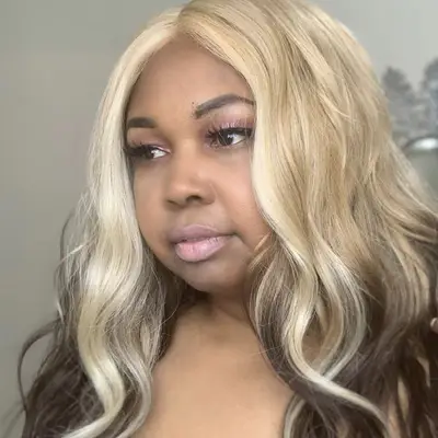 Woman with blonde to dark brown reverse ombré hair