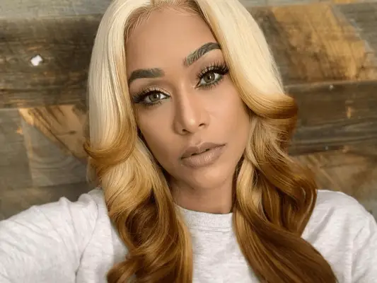 Tami Roman wears blonde to caramel reverse ombré hair