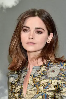 Jenna Coleman with shoulder length, center-parted hair