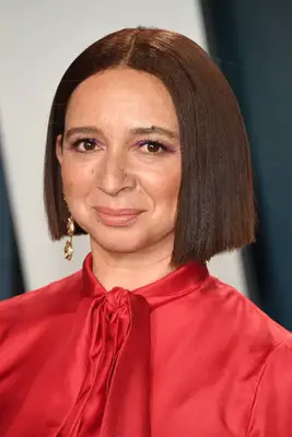 Maya Rudolph with a stick-straight bob and gold earring