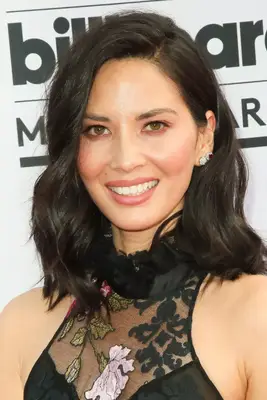 Olivia Munn with wavy shoulder-length hair