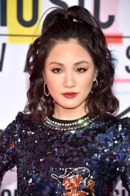 Constance Wu with a half-up, half-down wavy lob