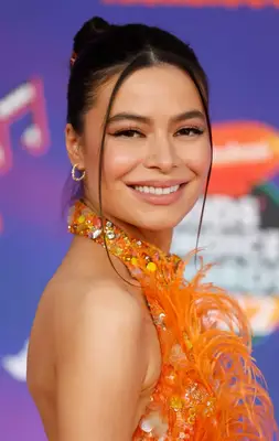 Miranda Cosgrove updo with face-framing tendrils