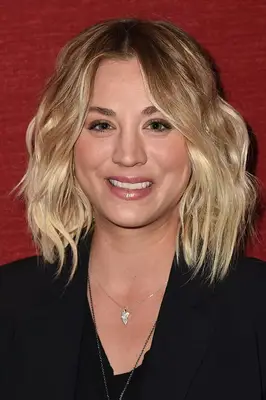 Kaley Cuoco with a blonde layered lob with dark roots