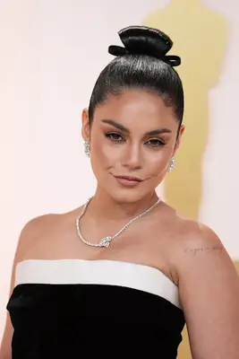 Vanessa Hudgens wearing a high bun 