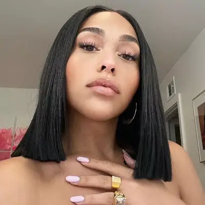 Jordyn Woods wears a blunt long bob haircut