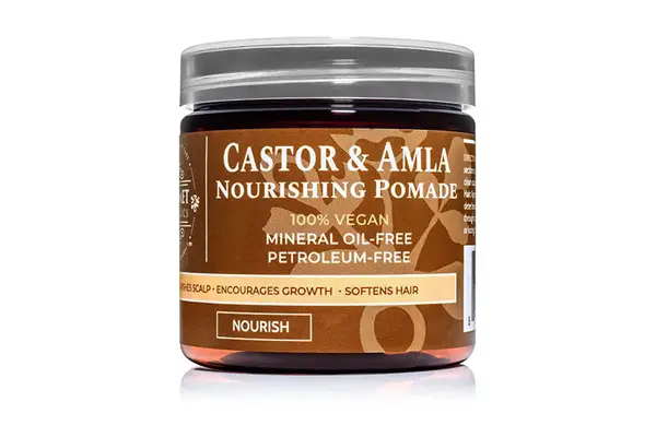 R+Co Dallas Biotin Thickening Conditioner on table