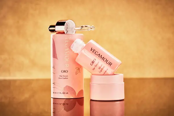 Vegamour hair loss treatment sitting atop a table