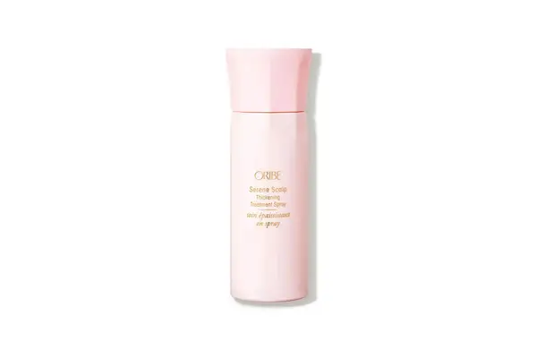 Oribe Maximista Thickening Spray on table