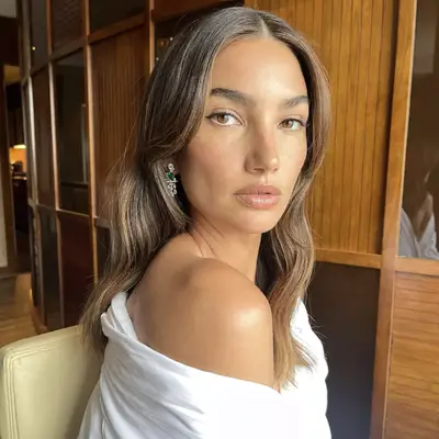 Lily Aldridge with brown hair with blonde highlights