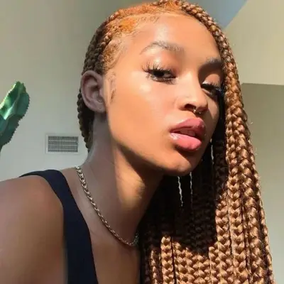 Asymmetrical blonde goddess braids