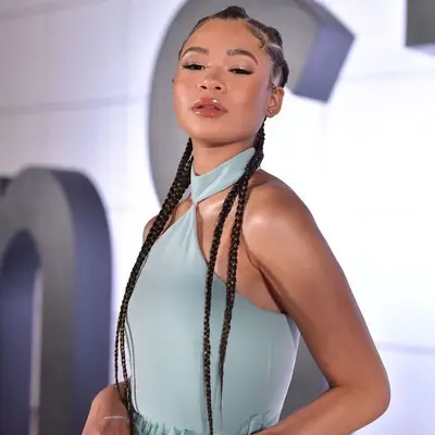 Stormy Reid wearing skinny goddess braids