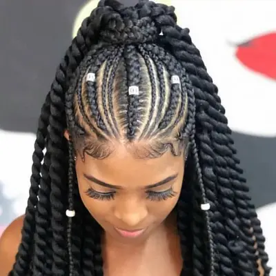 Goddess braids in a regal ponytail with silver charms and white beads