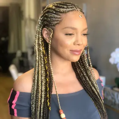 Brown and blonde goddess braids with hair charms and chunky beads