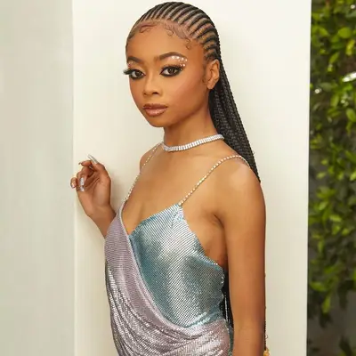 Skai Jackson in slicked back goddess braids