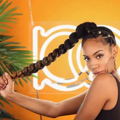 Chunky XL goddess braids in a high braided ponytail 